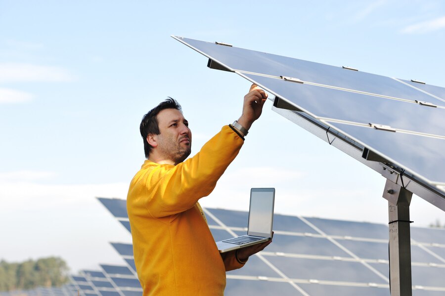 Solar panels being fitted to a roof